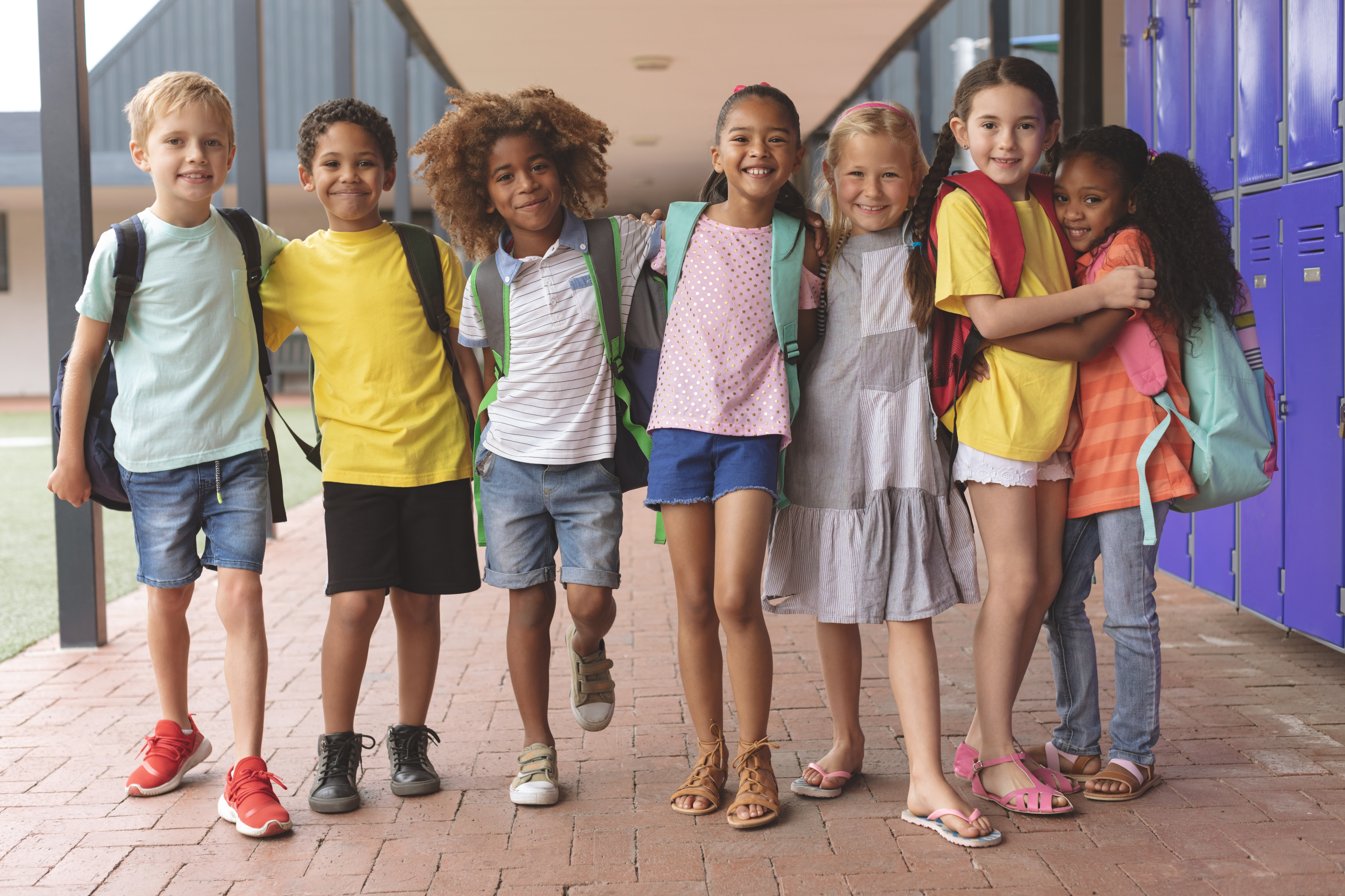 Kids Posed In Hallway